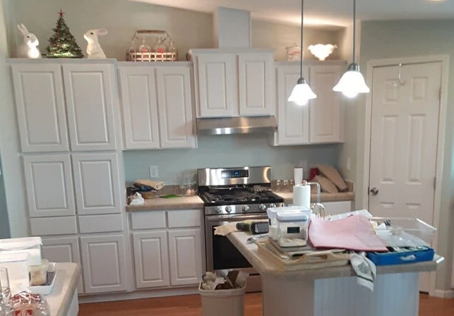 Nicew newly painted kitchen cabinets - Excellent Painters